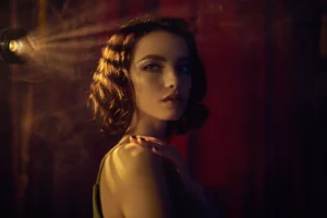 Cinematic portrait of a stylish subject with neutral tones and film-inspired color grading